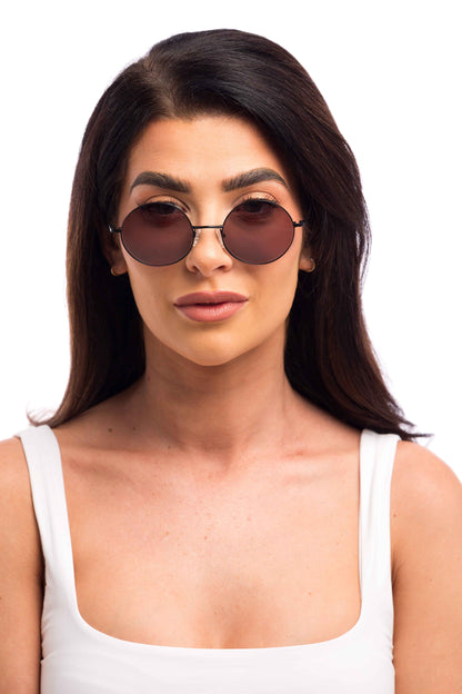 Woman Wearing Lennon Sunglasses Prescription (Brown)